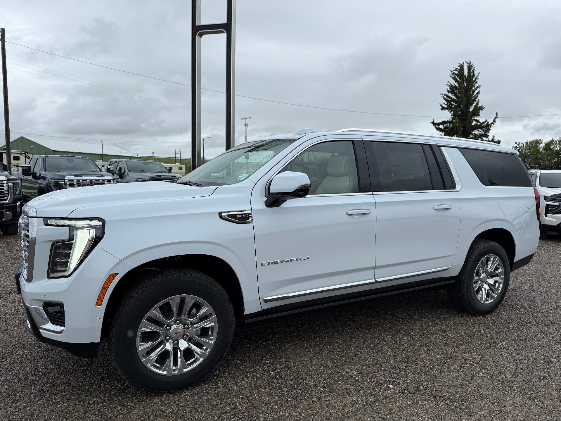 2026 GMC Yukon XL Denali in Glacier White Tricoat — front three-quarter view