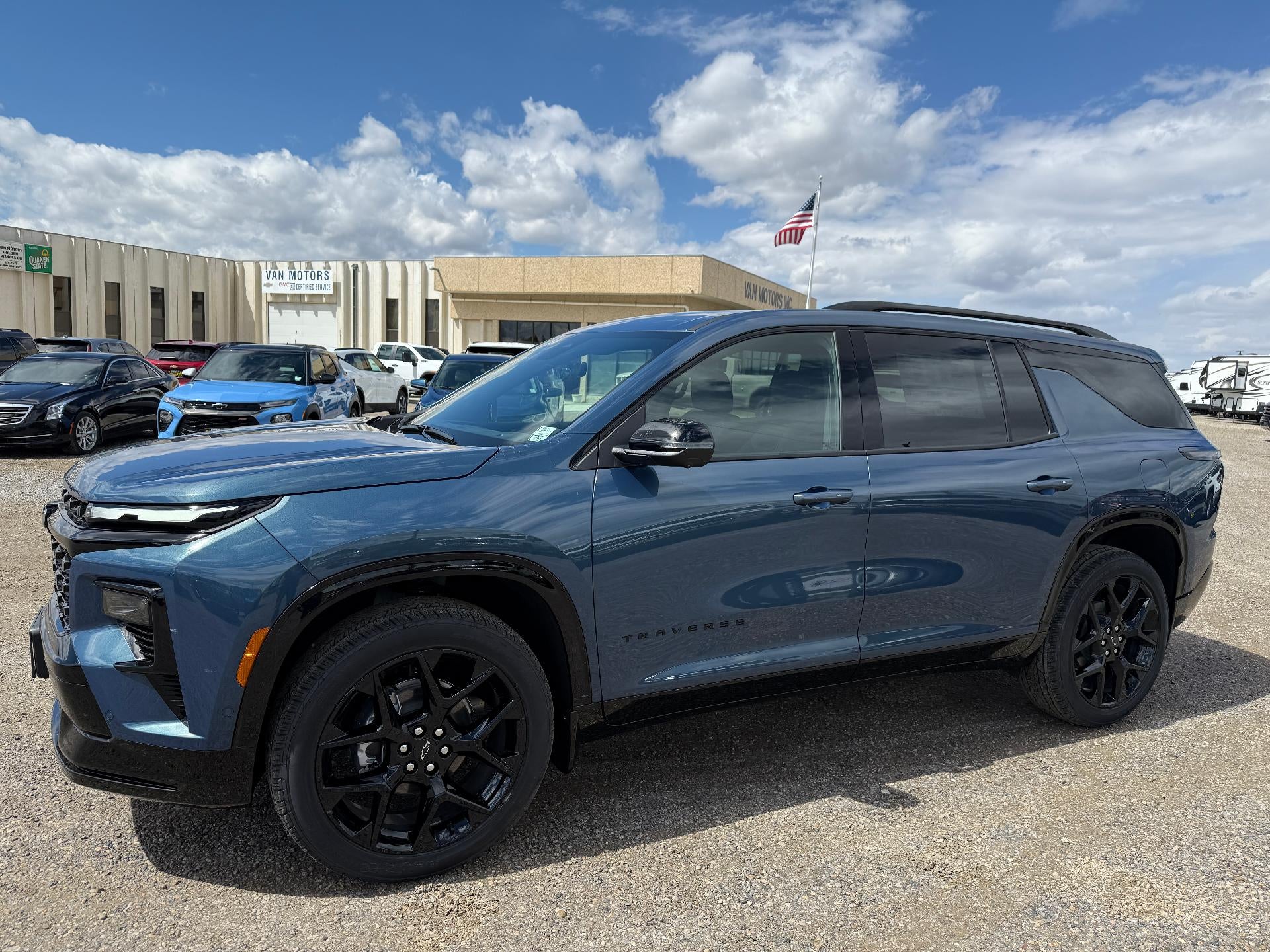 2026 Chevrolet Traverse RS in Lakeshore Blue Metallic — front three-quarter view