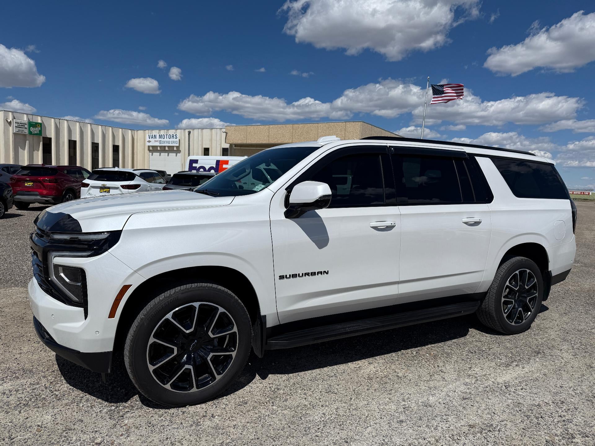 2025 Chevrolet Suburban RST in Iridescent Pearl Tricoat — front three-quarter view