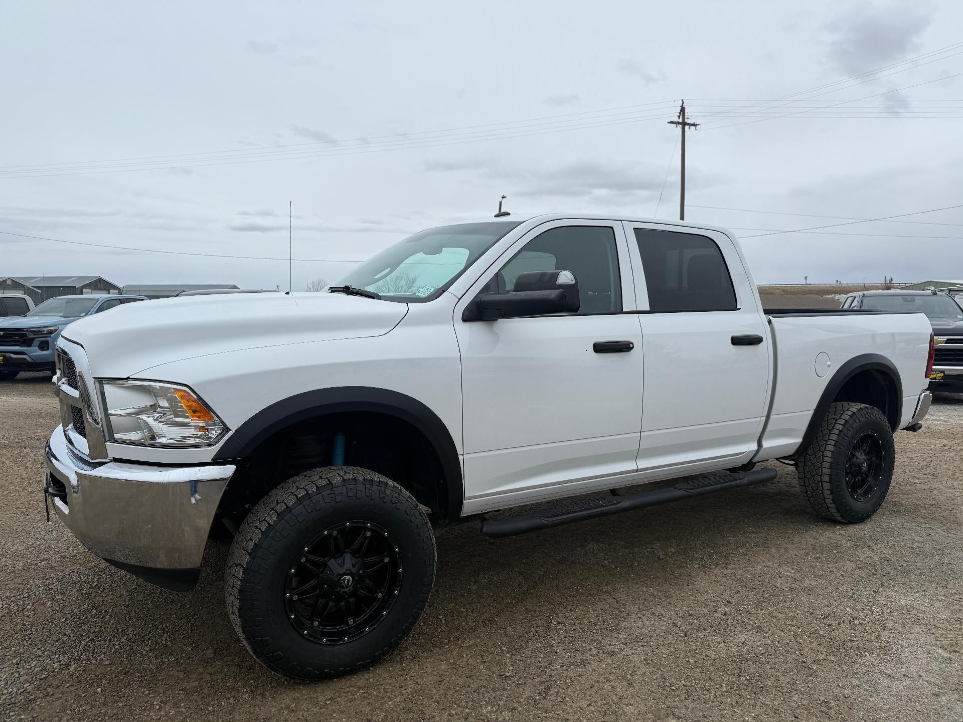 2017 RAM 2500 Tradesman in White — front three-quarter view