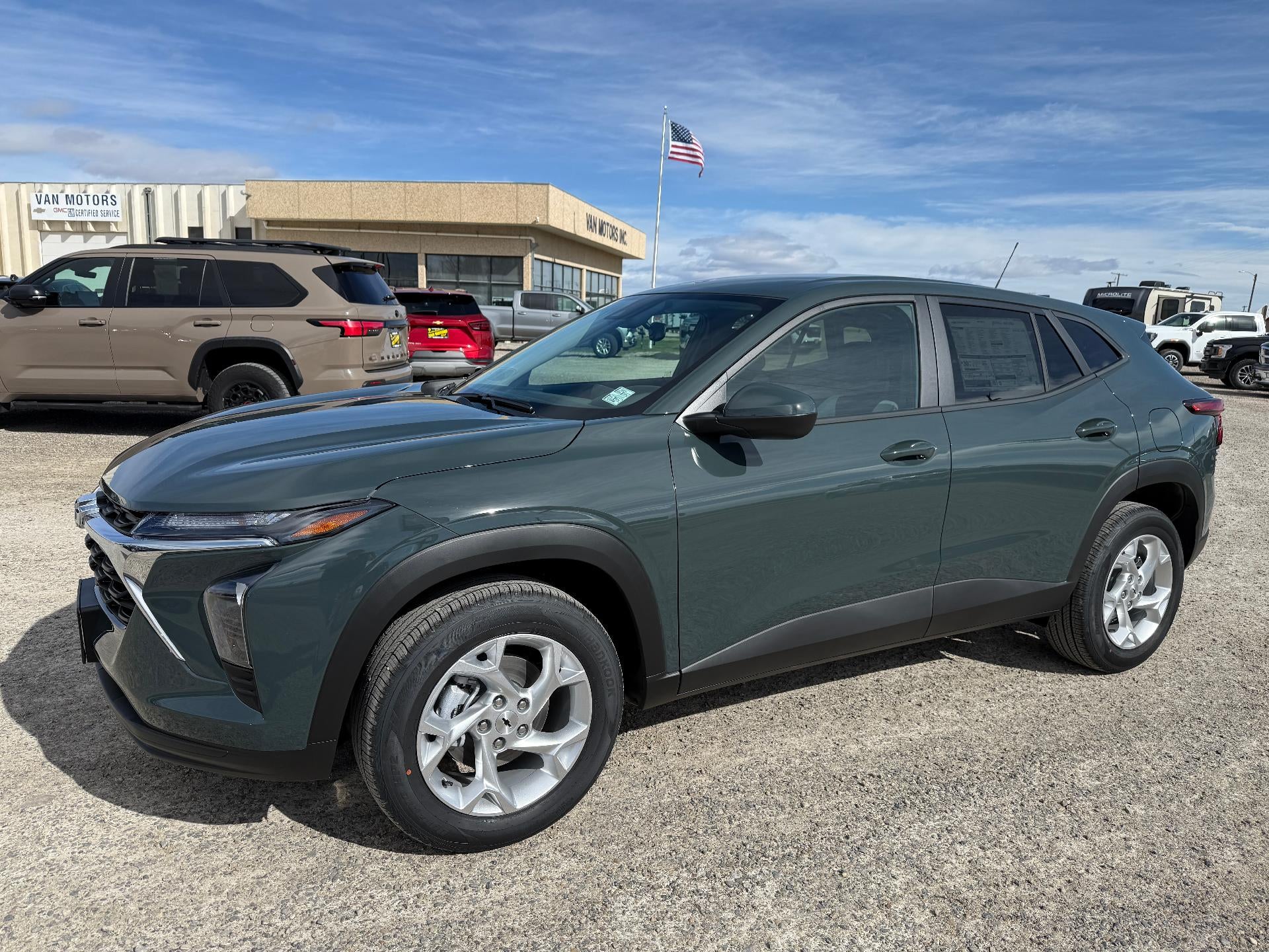2026 Chevrolet Trax LS in Cypress Gray — front three-quarter view